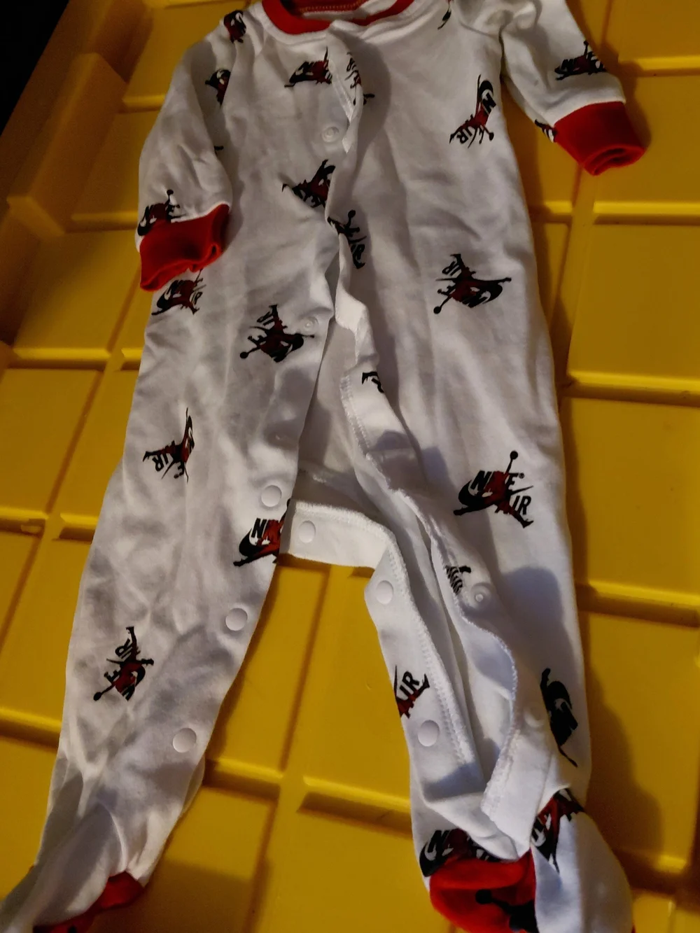 Jordan White Footed One-Piece with Red Trim and Black Logo Print